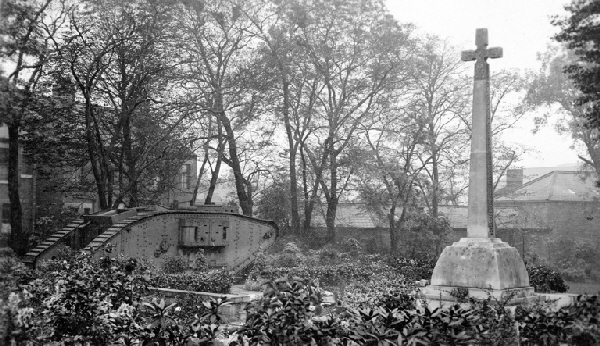 The Mirfield War Memorial and the presentation tank in Ings Grove park.